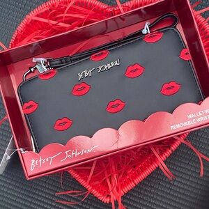 Betsey Johnson Black Wristlet with Red Lip Design